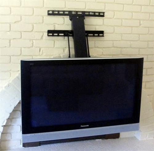 Best ideas about Fireplace Tv Mount
. Save or Pin Fireplace TV Mount lowers 30 inches up down Now.