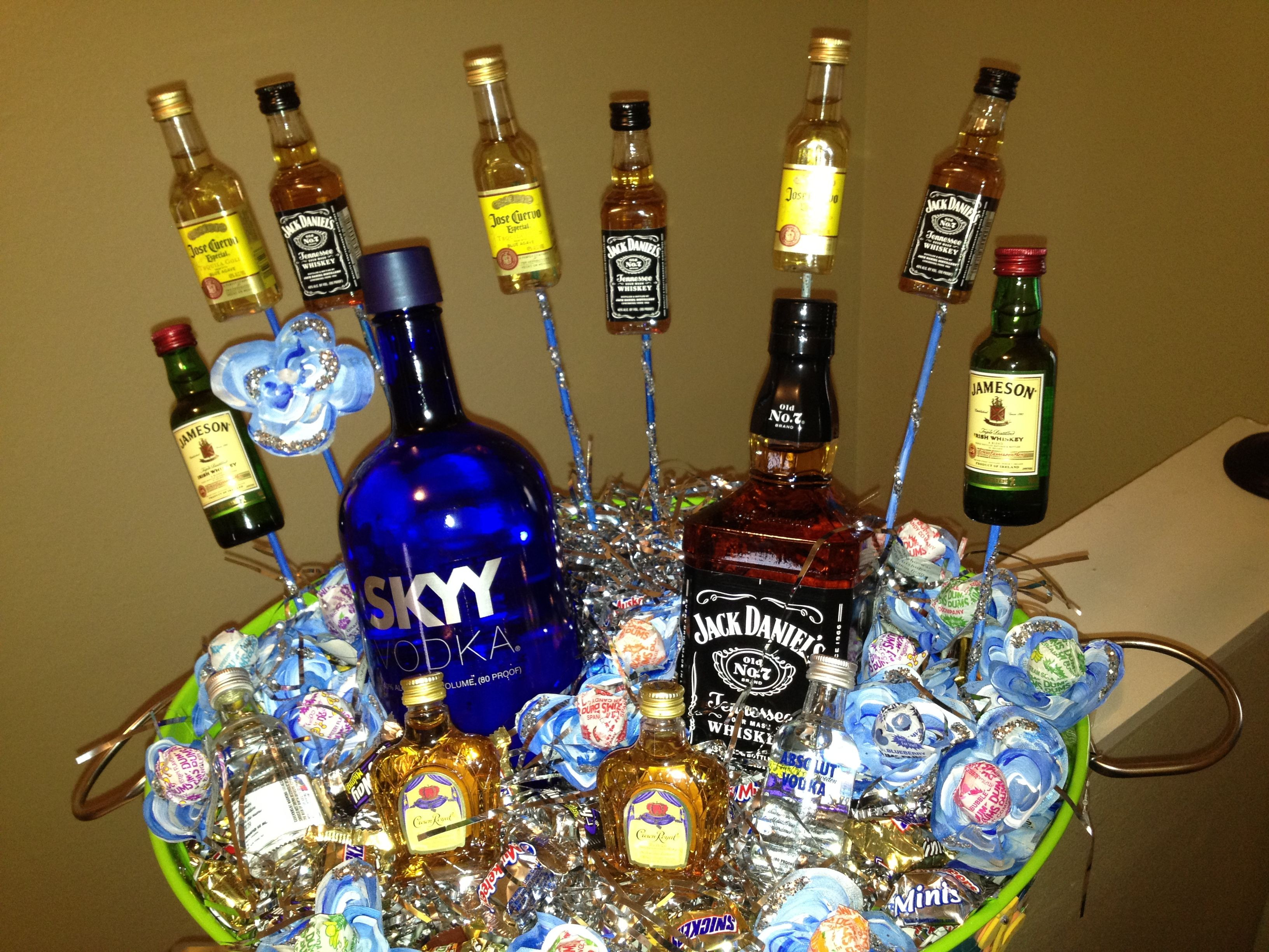 Best ideas about Liquor Gift Ideas
. Save or Pin 21st Birthday Liquor Basket Those Dum Dum flowers took Now.