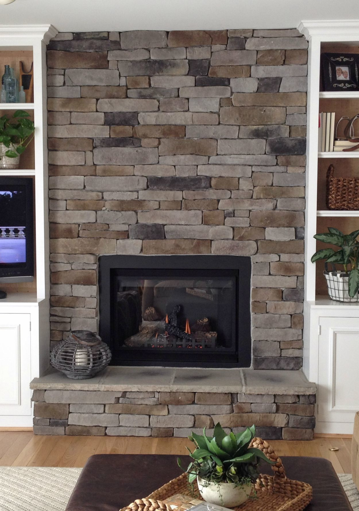 Best ideas about Stacked Stone Fireplace
. Save or Pin How to Create the Stacked Stone Fireplace Look on a Bud Now.